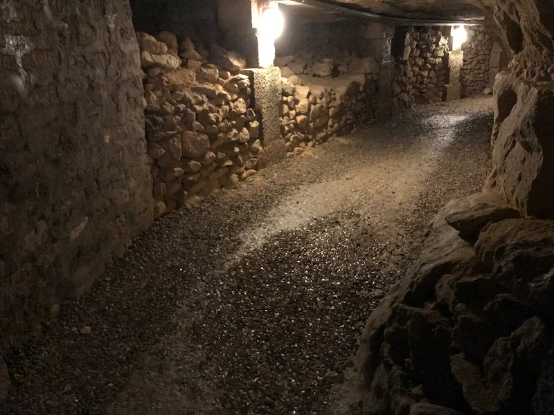 The French catacombs in Paris - one of the most haunted places in Paris The French catacombs in Paris - one of the most haunted places in Paris