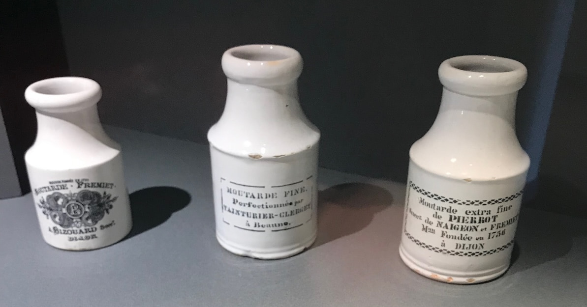 Antique pots of Dijon mustard
