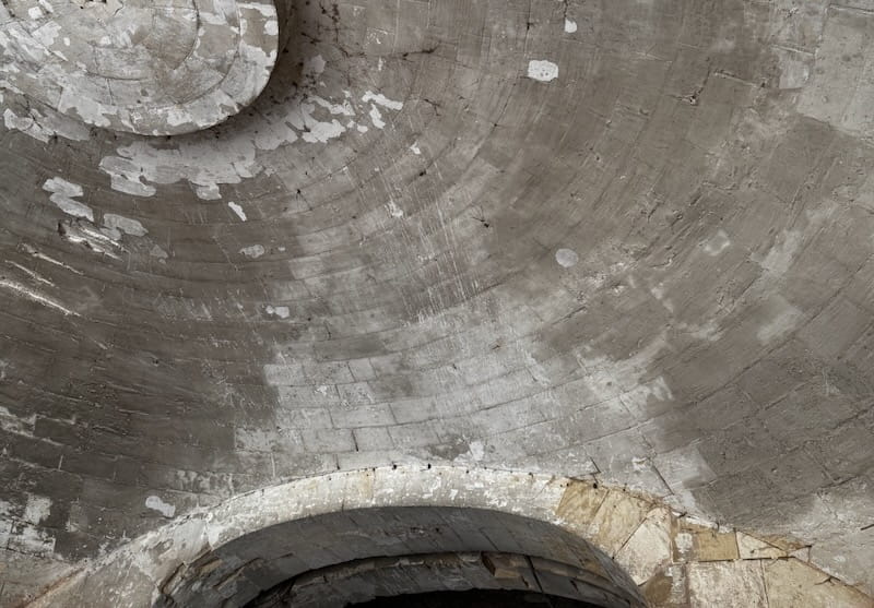 Ceiling scratches left by vehicle antennas passing through during the war