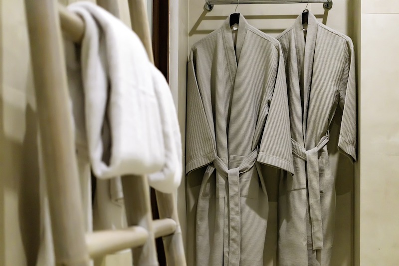 Bathrobes hanging in a bathroom