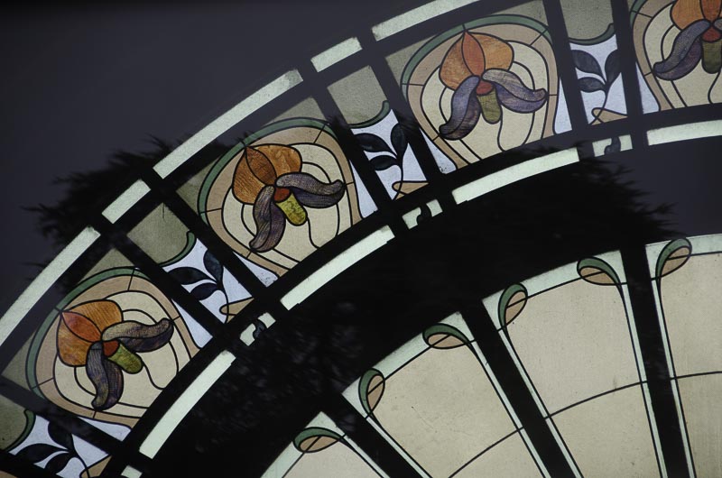 A close-up of the stained glass at the original source Cachat spring in France (Evian) A close-up of the stained glass at the original source Cachat spring in France (Evian)