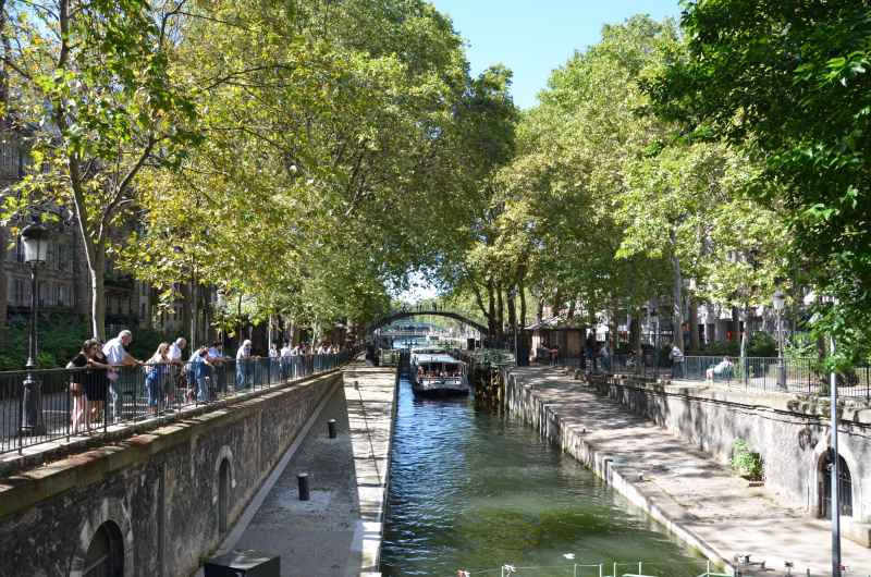 Canal Saint-Martin - taking a cruise, one of the unique things to do in Paris Canal Saint-Martin - taking a cruise, one of the unique things to do in Paris