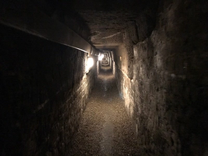 Dark passageway in the Paris Catacombs