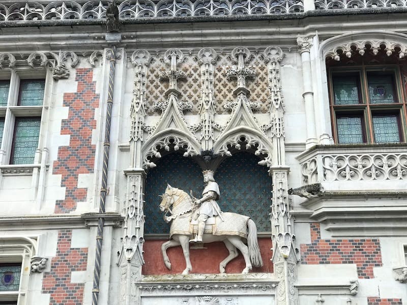 Louis XII on horseback statue, Chateau de Blois - one of the best things to do outside Paris is to visit the chateaux of the Loire Valley