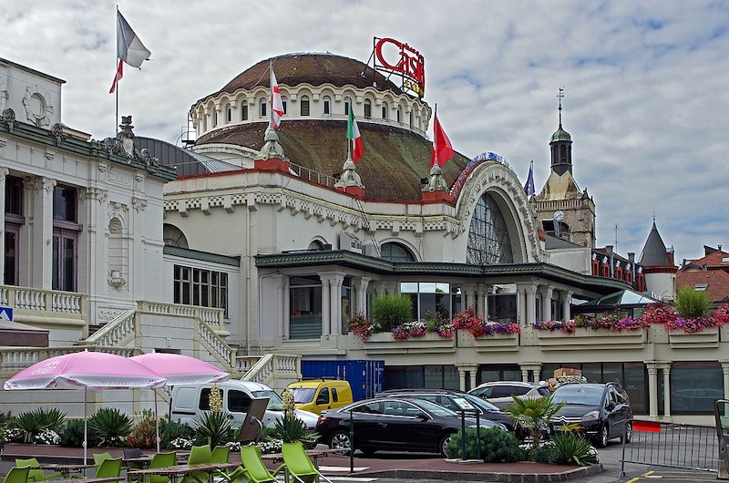 Casino at Evian-les-Bains, France, with cars parked outside