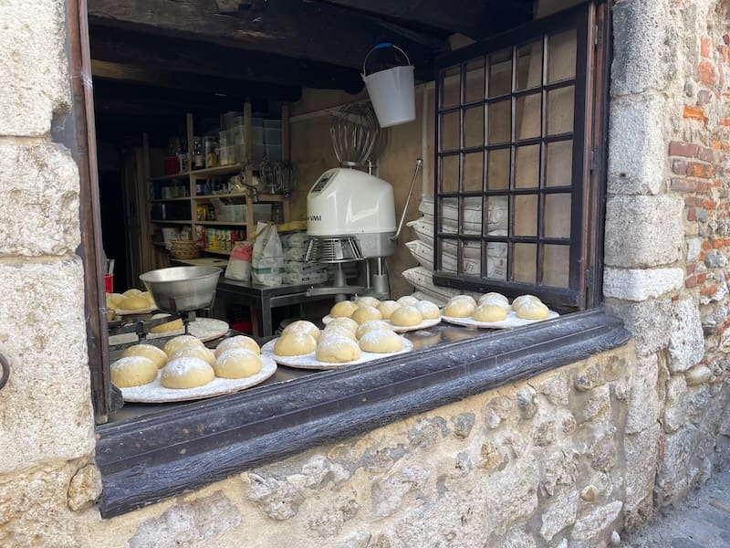 Mounds of dough of galette de Perouges, waiting to be baked