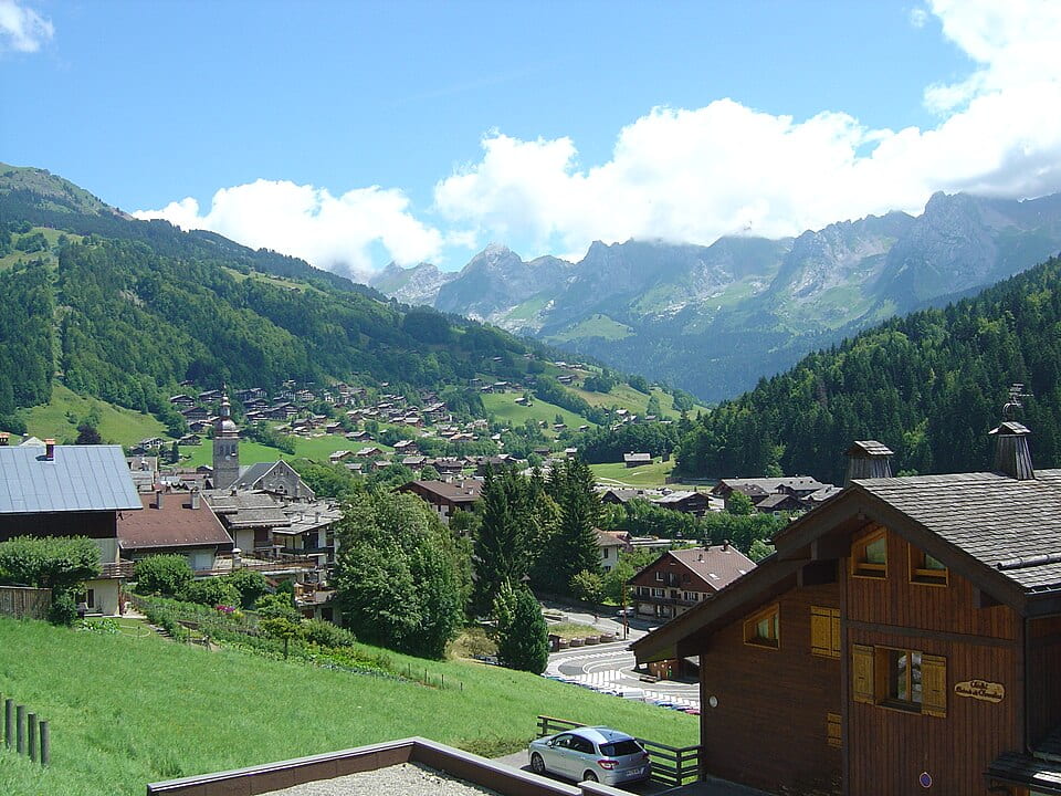 Long view of Le Grand Bornand, a mountain resort above Annecy, France, in summer