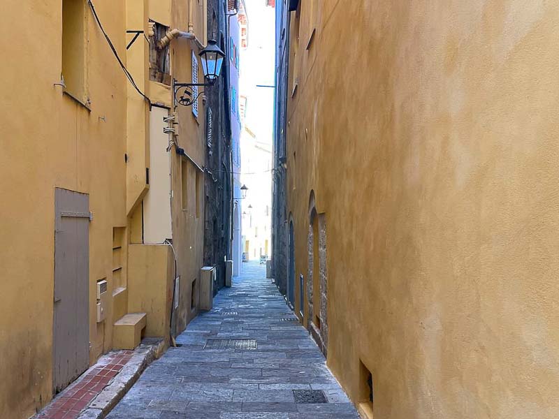 Narrow street in the old town of Grasse France