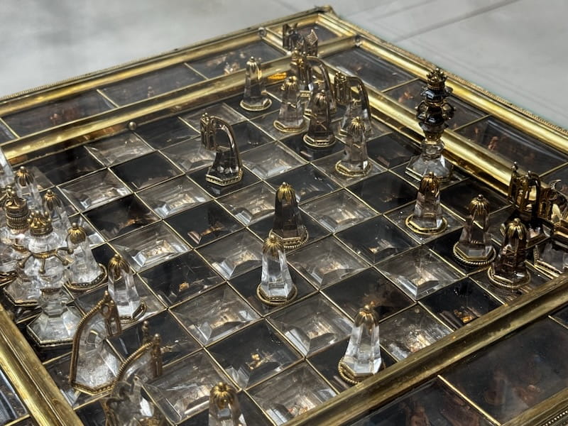 Rock crystal and smoky quartz chess set with tiny gilded silver and boxwood figures