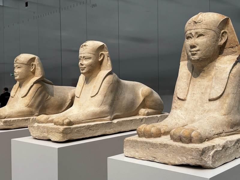 Three Egyptian sphinxes in a row
