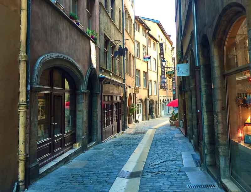 Narrow winding street in Old Lyon, leading to several traboules of Lyon