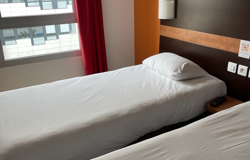 Bedroom in Lyon 1ere Classe Part-Dieu hotel