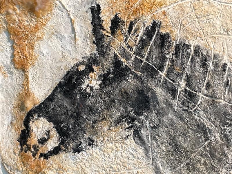 Replica of prehistoric art depicting a horse, drawn with coal, in the Cosquer Grotto in Marseille. Replica of prehistoric art depicting a horse, drawn with coal, in the Cosquer Grotto in Marseille.
