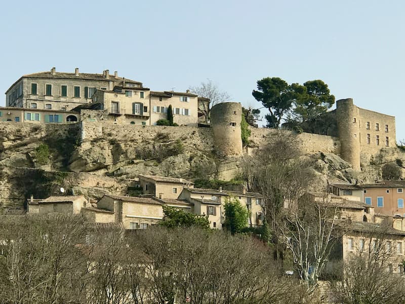 Menerbes, Provence seen from below: considered one of the best villages in south of France Menerbes, Provence seen from below: considered one of the best villages in south of France