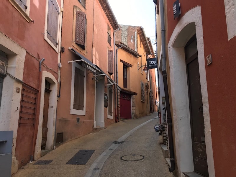 Narrow street in Roussillon Provence - watch out for these with your car hire in France