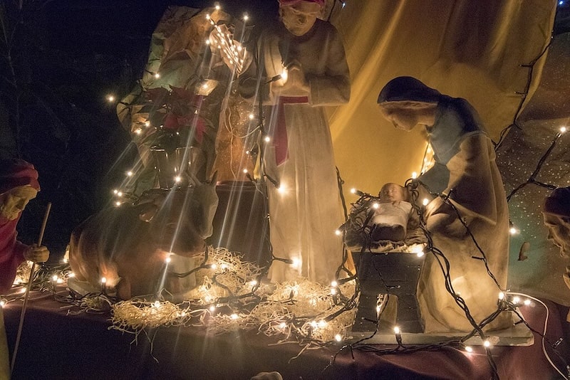 A classic French nativity scene during Christmas in France, depicting the birth of Jesus and the arrival of the Three Wise Men A classic French nativity scene during Christmas in France, depicting the birth of Jesus and the arrival of the Three Wise Men