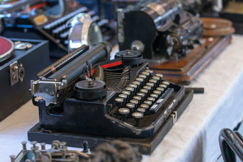 vintage typewriters at the flea market, Nice, France - typical of what you could find in antique fairs, France