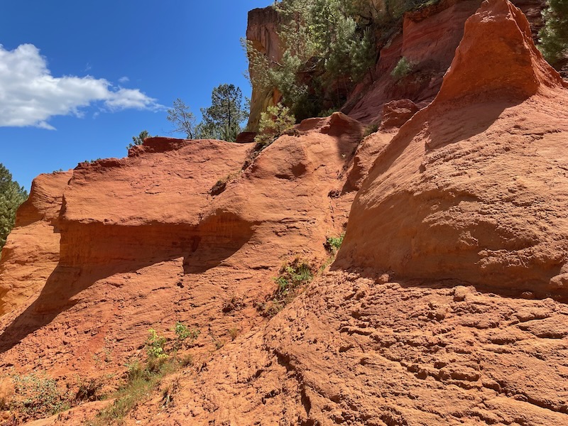 The hills of Roussillon are of the deepest ochre The hills of Roussillon are of the deepest ochre