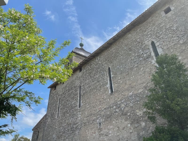 Protective wall of church in Perouges, built to withstand attack