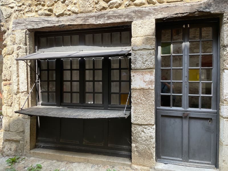 Horizontal window shutters in medieval Perouges