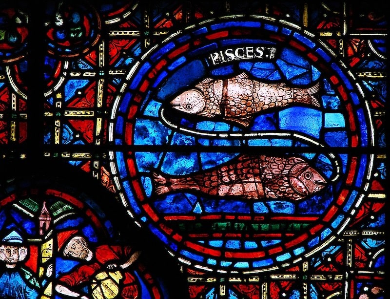 Pisces astrological sign stained glass at Chartres Cathedral Pisces astrological sign stained glass at Chartres Cathedral