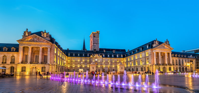 Palace of Dukes of Burgundy, Dijon, France, with fountains lit up at night Palace of Dukes of Burgundy, Dijon, France, with fountains lit up at night