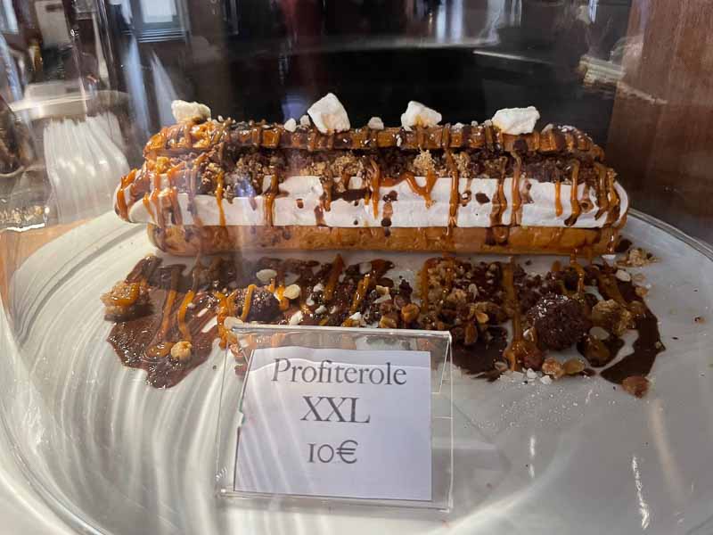 A giant profiterole you can try in the Food Traboule, the food court getting its inspiration from the traboules of Lyon