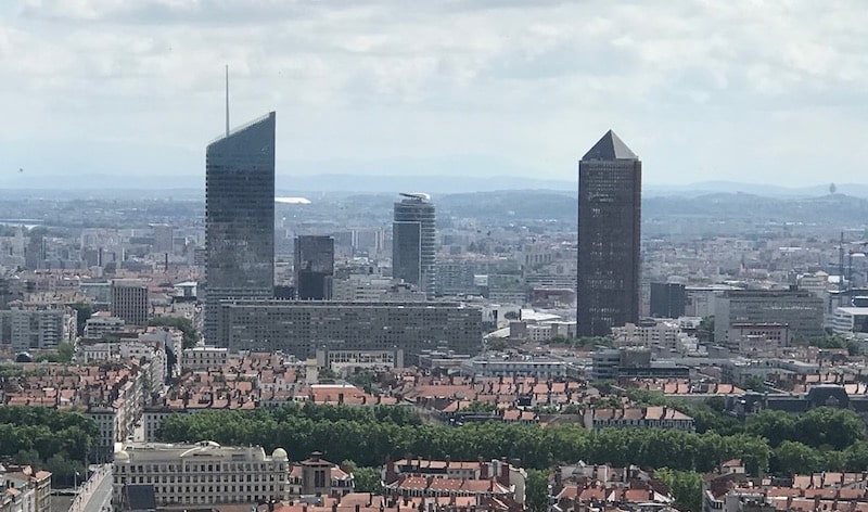 Long shot of Hotel Radisson Blu, Lyon, and skyline, one of the more unique Lyon France hotels near train station