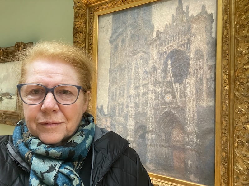 Me, standing next to Monet's gray cathedral in Rouen Museum of Fine Arts