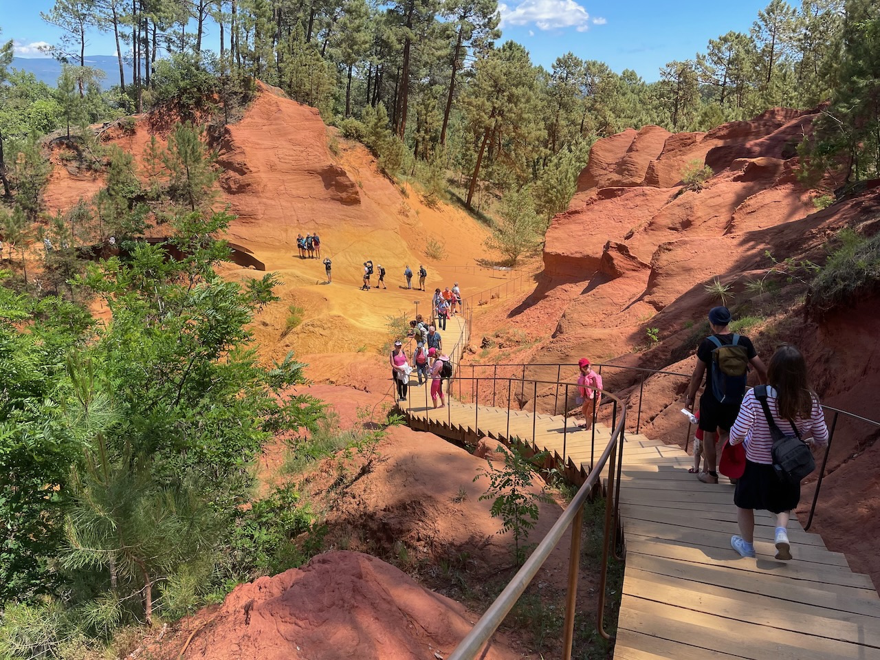 Tourists visit the Ochre Trail in Roussillon Tourists visit the Ochre Trail in Roussillon