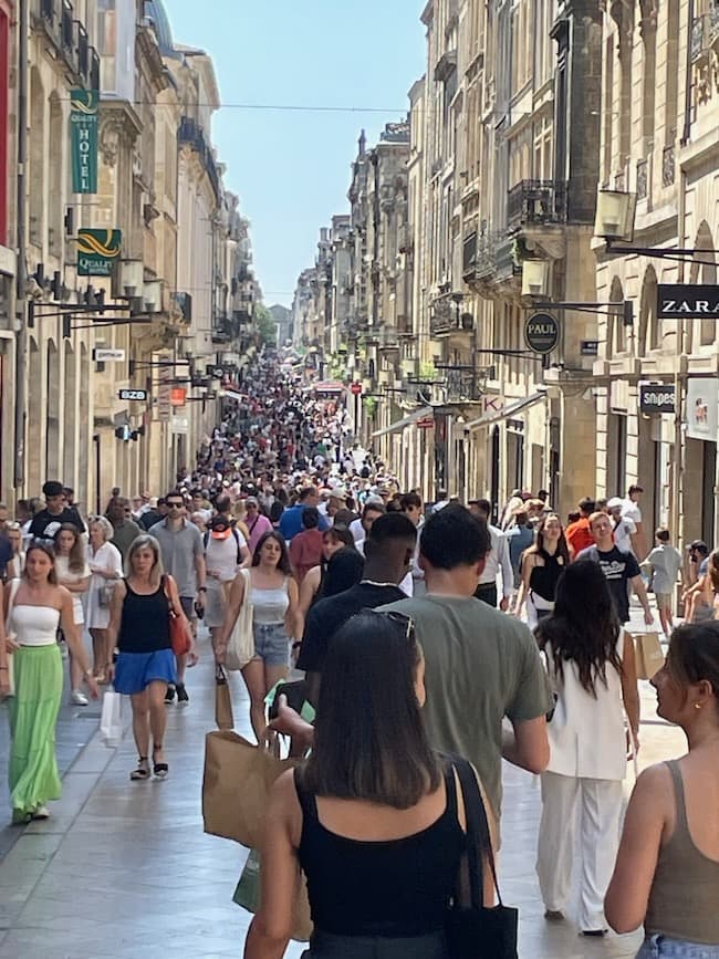 Crowded shopping street Rue Sainte-Catherine, an essential sight during your Bordeaux travel
