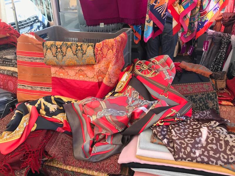 Scarves on sale at Isle sur la Sorgue weekly market Scarves on sale at Isle sur la Sorgue weekly market