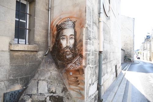 Street mural of Clotaire I by C215, an urban street artists